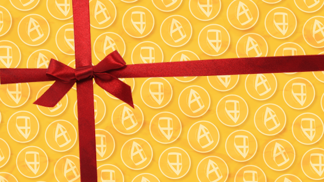 Ingepakt cadeautje met een mooie rode strik erop.